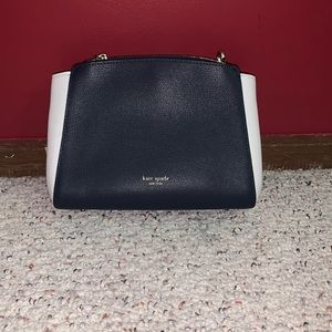 I am selling a Kate Spade Cross body purse